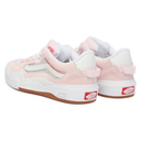 Pink and white Vans sneakers with red labels on a white background