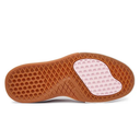 Brown sole of a shoe with a patterned pink insole on a white background