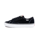 Black sneaker with a white sole on a light gray background