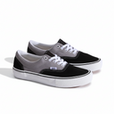 Black and gray sneakers with white laces on a white background