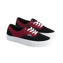 A pair of Vans platform sneakers in black and burgundy red, featuring white laces and a thick white rubber sole, shown against a plain white background.