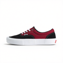 A low-top platform sneaker in black and burgundy canvas with a thick white platform sole, white laces, and a small red Vans logo on the heel.