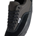 Gray and black sneaker with Vans logo on a white background