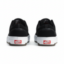 Black sneakers with white soles and red labels on a white background