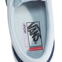 Close-up of a Vans shoe with a focus on the brand logo and text.