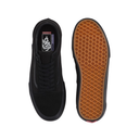 A pair of black Vans platform sneakers shown from the top and side, with the textured brown Vans waffle sole visible on the right, set against a plain white background.