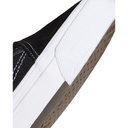 Close-up of a black and white sneaker sole on a white background