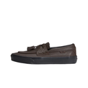 Black woven loafer on a light gray background