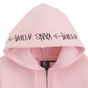 A close-up of a light pink zip-up hoodie with black Vans Atiba script printed across the hood, featuring a silver zipper and a black Vans Atiba brand tag.