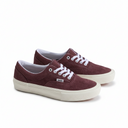 Pair of maroon sneakers with white laces on a white background