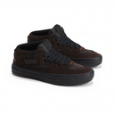 A pair of dark brown suede and mesh mid-top skate shoes with black laces, black soles, and subtle orange accents on the side, displayed against a clean white background.