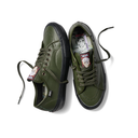 A pair of Vans low-top sneakers in olive green leather with black rubber soles, shown from a top-down angle on a white background.