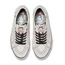 A pair of Vans classic low-top sneakers in off-white leather with black laces, shown from a top-down view on a white background.