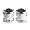White high-top sneakers with green accents and 'Una' branding on a white background