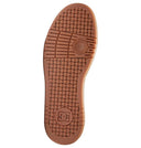 Brown shoe sole with textured pattern on a white background