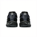 A pair of Nike Air Max 80s sneakers shown from the back, featuring a black and dark navy mesh upper with glossy wave-like overlays and a dark gray Air Max sole.