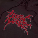 Dark hoodie with red and white logo on a dark background