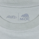 Close-up of a gray sweatshirt with a logo and text on the collar.