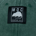 Green jacket with a black patch featuring 'MOC Premium Shit' text and logo.