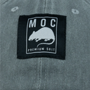 Patch with 'MOC Premium Shit' text and logo on a gray background