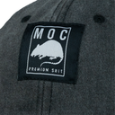 Dark gray cap with a black patch featuring a rat illustration and text on a white background