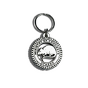 Metal keychain with circular design and text on a white background